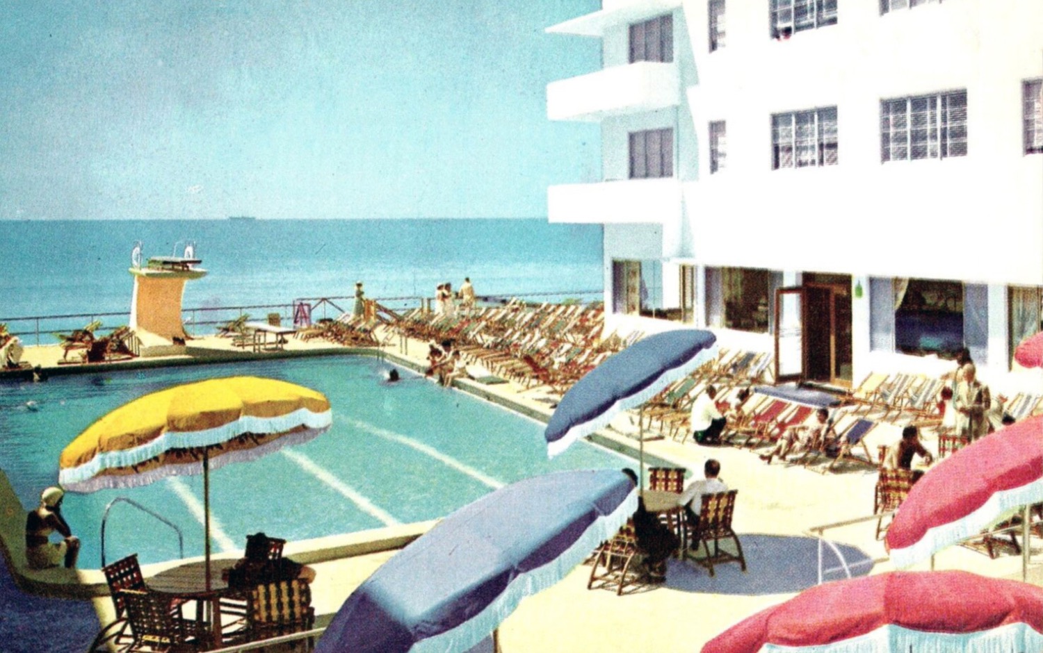 1950s postcard of the Delmonico Hotel pool deck in Miami Beach with pastel parasols